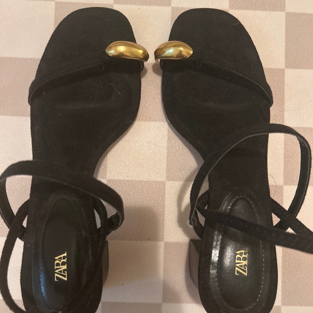 Black heeled sandles with gold detail